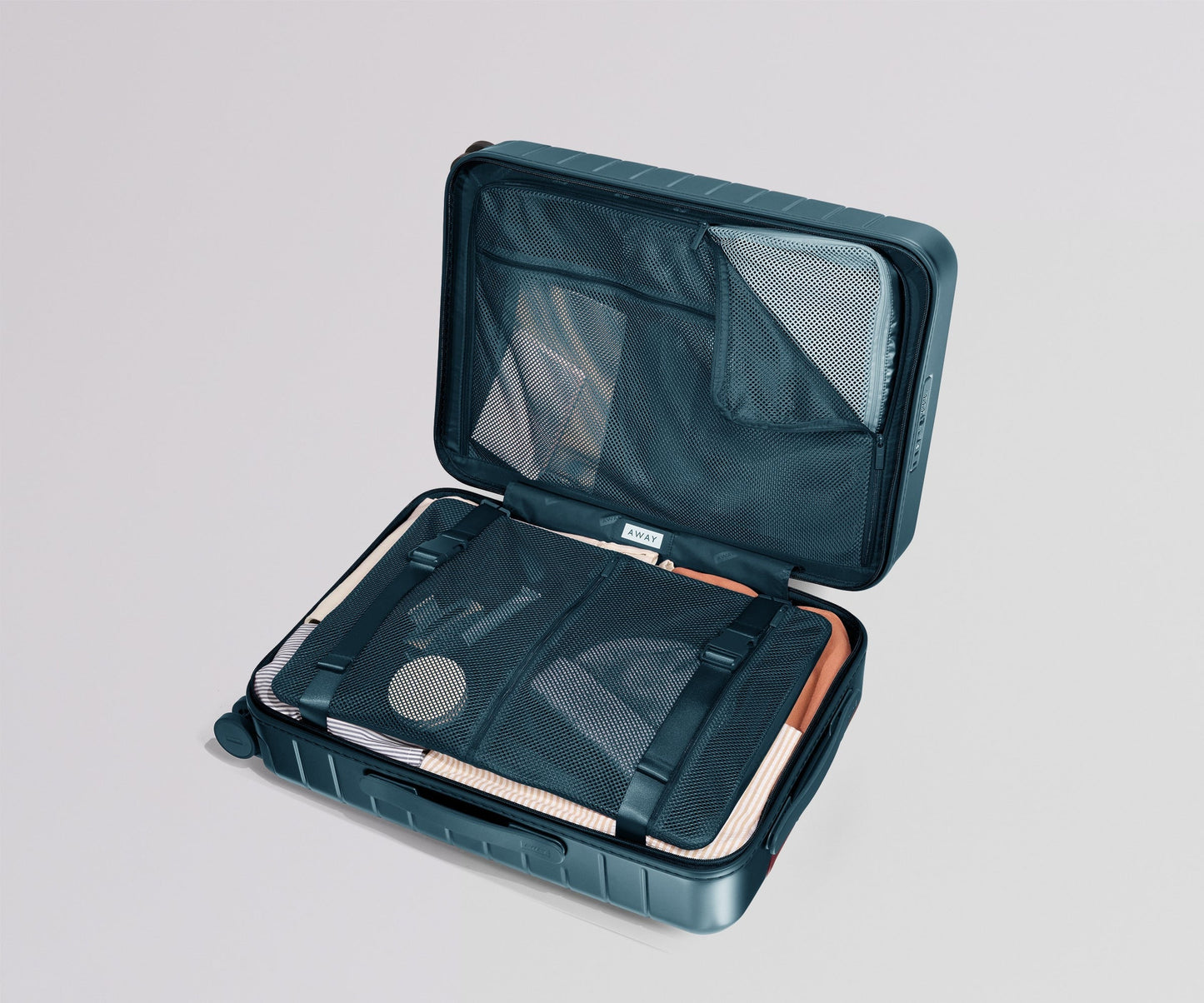 The Bigger Carry-On in Stormy Teal